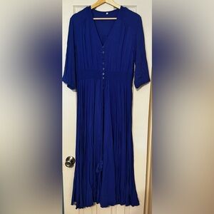Bright blue dress with cinch waist and buttons